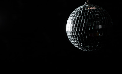 mirror ball on black background. with copy space.