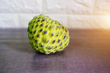 Sugar apple or custard apple with slice isolated on the background, exotic tropical Thai annona or cherimoya fruit, healthy food