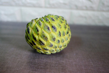 Sugar apple or custard apple with slice isolated on the background, exotic tropical Thai annona or cherimoya fruit, healthy food