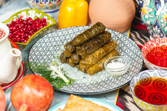 National Uzbek dish, rudetiki from grape leaves with minced meat and rice steamed