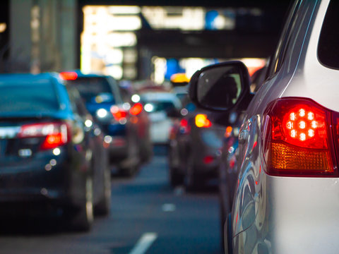 Close Up Of Tail Light Of A Car Waiting In Long Queue Of Traffic. Stopped Car With Its Brake Lights On In The City Of Melbourne, Australia.