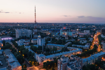 Fototapeta premium Aerial view of night city Voronezh after sunset, panorama cityscape