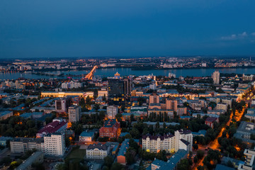 Obraz premium Aerial view of night city Voronezh after sunset, panorama cityscape