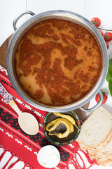 Top view of plate with meatballs soup, traditional plate of the Romanian cuisine, ciorba de perisoare