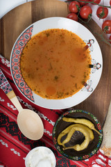 Top view of plate with meatballs soup, traditional plate of the Romanian cuisine, ciorba de perisoare
