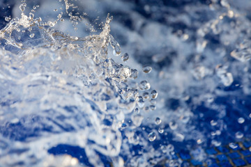 Water splash in a fountain, close up, macro