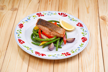 salmon steak with vegetables