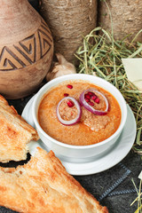 Cream-sur of peas, potatoes, carrots, served with homemade bread according to the Georgian recipe. National cuisine