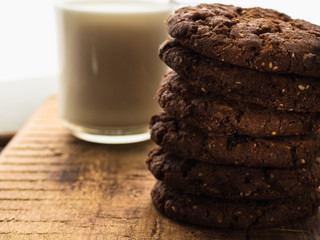 milk oatmeal cookies on wooden background