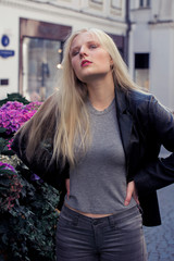 Beautiful girl walking around the city in the afternoon