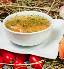 Fish soup with greens, potatoes, carrots and onions in Georgian. National cuisine