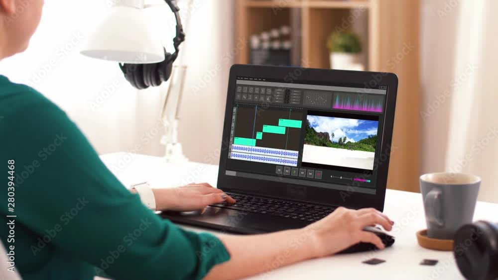 Poster technology, post production and vlog concept - woman working on travel video in editor program on la