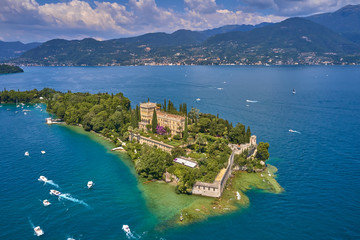 Unique view of the island of Garda. In the background is the Alps. Resort place on Lake Garda north...