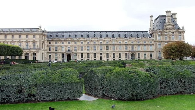 Louvre museum art galleries, square and buildings with garden in Paris, France