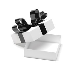 Gift box decorated with ribbon. Open empty container with black bow