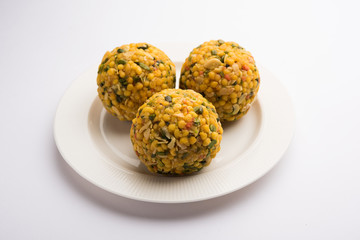 Jumbo Boondi Laddu mixed with dry fruits also know as laddoo/ ladoo/ laddo or Sweet dumplings made during festivals or weddings