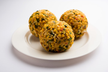 Jumbo Boondi Laddu mixed with dry fruits also know as laddoo/ ladoo/ laddo or Sweet dumplings made during festivals or weddings