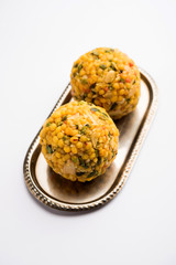 Jumbo Boondi Laddu mixed with dry fruits also know as laddoo/ ladoo/ laddo or Sweet dumplings made during festivals or weddings