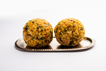 Jumbo Boondi Laddu mixed with dry fruits also know as laddoo/ ladoo/ laddo or Sweet dumplings made during festivals or weddings