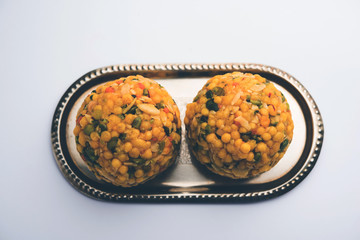 Jumbo Boondi Laddu mixed with dry fruits also know as laddoo/ ladoo/ laddo or Sweet dumplings made during festivals or weddings