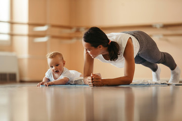 Trying to be fit just like his mummy!