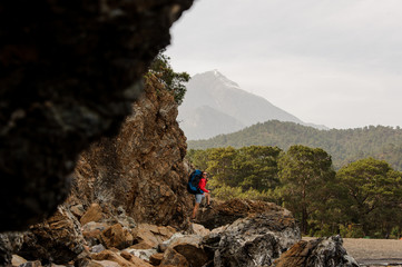 Female trekker hiking on hills in Turkey