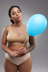 Fat arrogant Afro American woman posing for camera