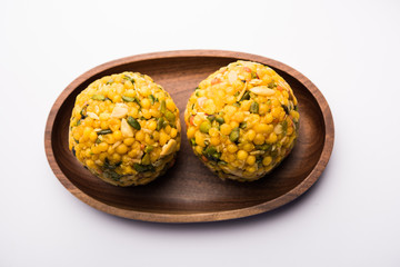 Jumbo Boondi Laddu mixed with dry fruits also know as laddoo/ ladoo/ laddo or Sweet dumplings made during festivals or weddings