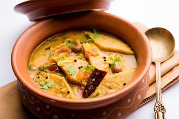 Dal Dhokli, Varan Phal or Chakolya is a gujarati, Rajasthani and maharashtrian dish made using diamond shape wheat flour cakes boiled in a dal. It's an easy one pot meal. served in a bowl.