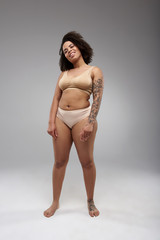 Fat arrogant Afro American woman posing for camera