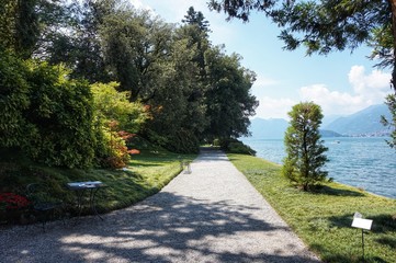 View of Lake Como through the trees at Villa Menzi. Bellagio