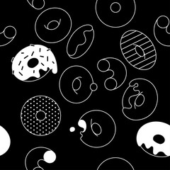 Donuts graphic on black background seamless pattern