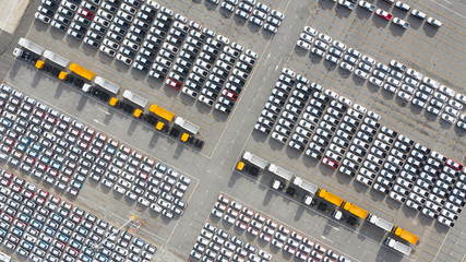 Aerial view new cars export terminal, New cars waiting for import export at deep sea port.