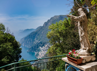 View of beach and old buildings in Positano town at Amalfi coast, Italy.