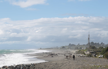 HOKITIKA , NEW ZEALAND - 10 April 2016 : The Traveller on Magical atmosphere Hokitika Bay road in...