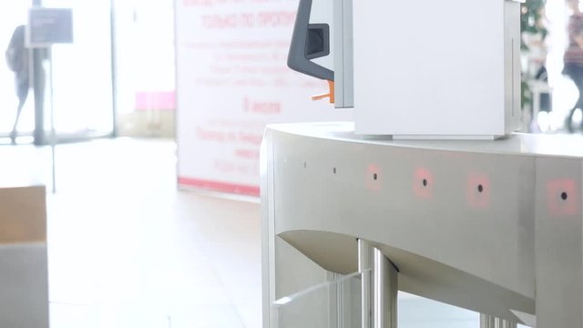 Check on e-pass system. Media. Turnstile with card reader. Electronic checkpoint. Access control system