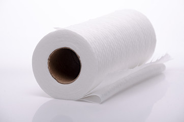 roll of white cotton napkins on white background, insulated