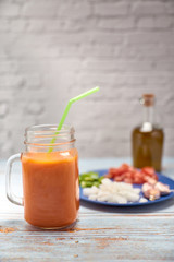 view of a fresh pitcher of red gazpacho
