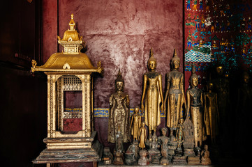 Antique old Buddha statue at Wat Xiang Thong. Luang Prabang, Laos