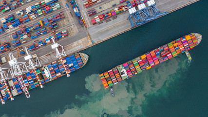 Aerial view cargo ship terminal, Unloading crane of cargo ship terminal, Aerial view industrial...