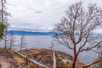 View over Inlet, ocean and island with rocks and mountains in beautiful British Columbia. Canada.