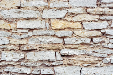 Fragment of a stone wall.