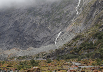 Green valley,moss and stones and Mountain in Franz Josef Glacier, New Zealand South Island