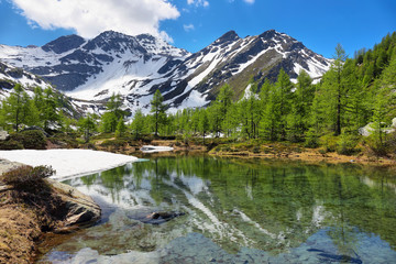 Fototapeta na wymiar Glacial Arpy lake near Morgex, Aosta Valley in north Italy