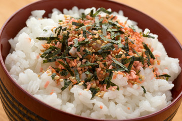 Traditional Japanese bowl with cooked white rice and furikake