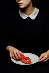 boiled crayfish on a black background