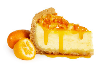 Piece of cheesecake with fresh kumquat and syrup