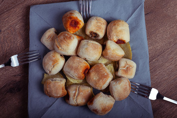 mini sandwich plate next to three brown table forks