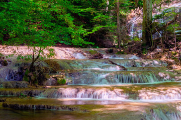 cascade in steps from the Ochiul Beiului. Caras Severin. Romania