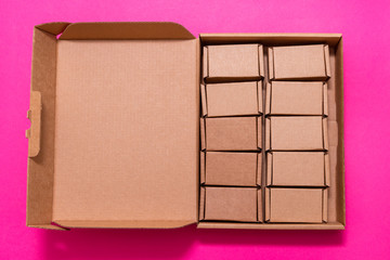 Lot of small cardboard boxes inside of large case with cover